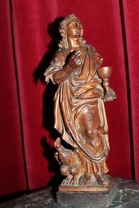 High Quality Statue Of St. John Evangelist style baroque en hand-carved wood, Lime Tree, Belgium 17 th century