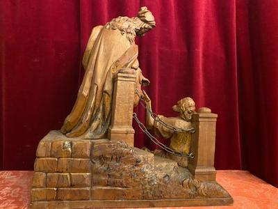 Wood Carved Statue Of Saint Elizabeth Giving A Coin With Her Right Hand To The Left Hand Of Beggar As Charity Gesture style Gothic - style en Hand - Carved Wood , Ortisei Sud Tirol Italy  20th century