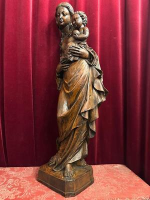 St. Mary With Child Sculpture. en Hand - Carved Wood , 20 th century