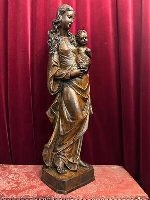 St. Mary With Child Sculpture. en Hand - Carved Wood , 20 th century