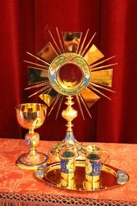 Chalice, Monstrance, Cruets. en brass / gilt / emaille, 20th century