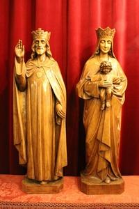 Statues  King Christ And St. Mary With Child. Signed E De Soil style ART - DECO en hand-carved wood , Dutch 20th century (1920)