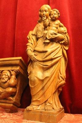 Sculpture St. Mary With Child And Matching Console Total Height 86 Cm. Height Statue 61 Cm. en fully hand-carved wood oak , Belgium 20th century ( anno 1915  )